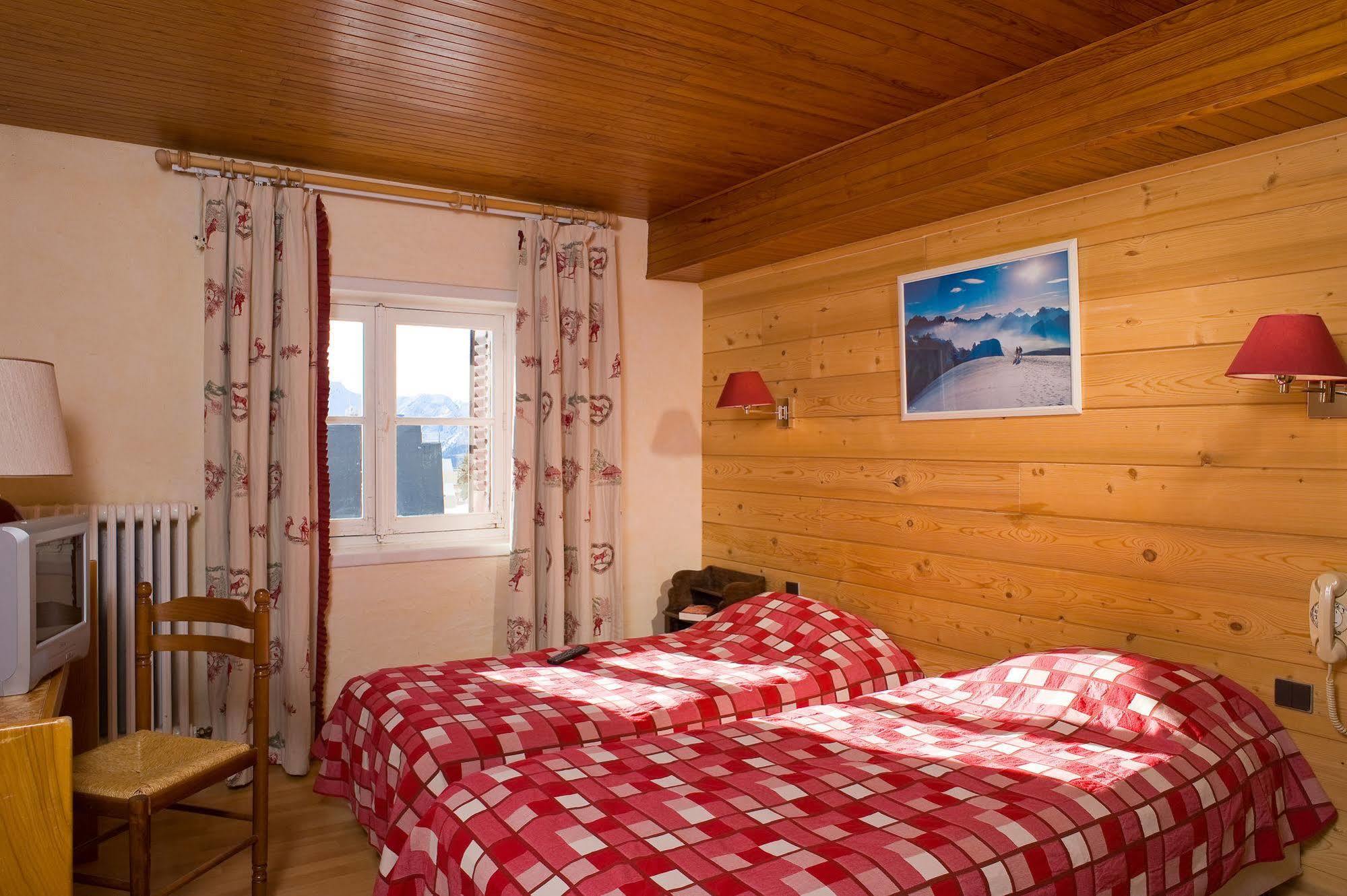 Madame Vacances Hotel Le Christina Alpe d'Huez Exterior foto